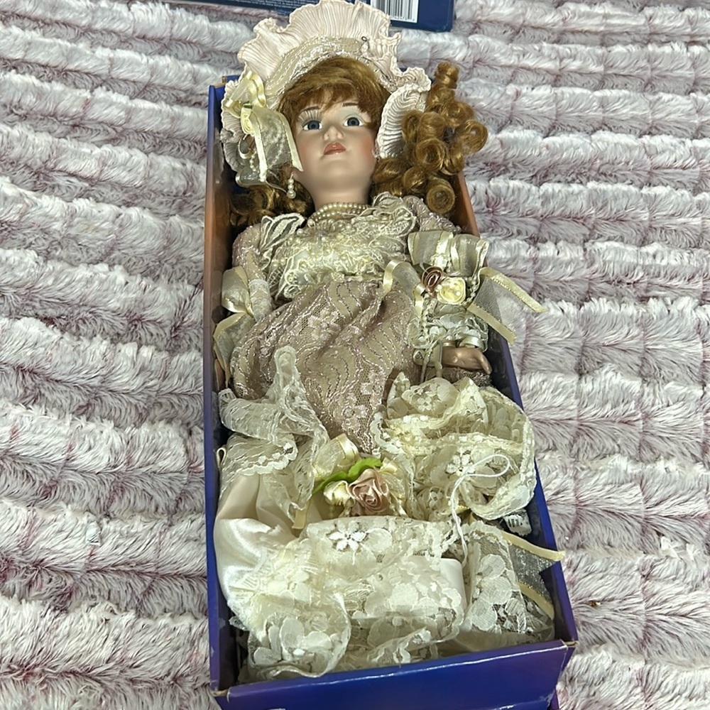 collectible doll by Ashley Belle with stand and Certificate